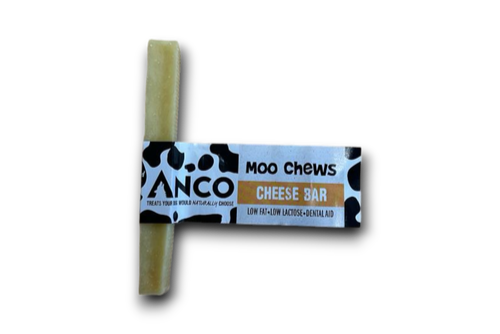 Small dog chew treat, with cow print packaging.