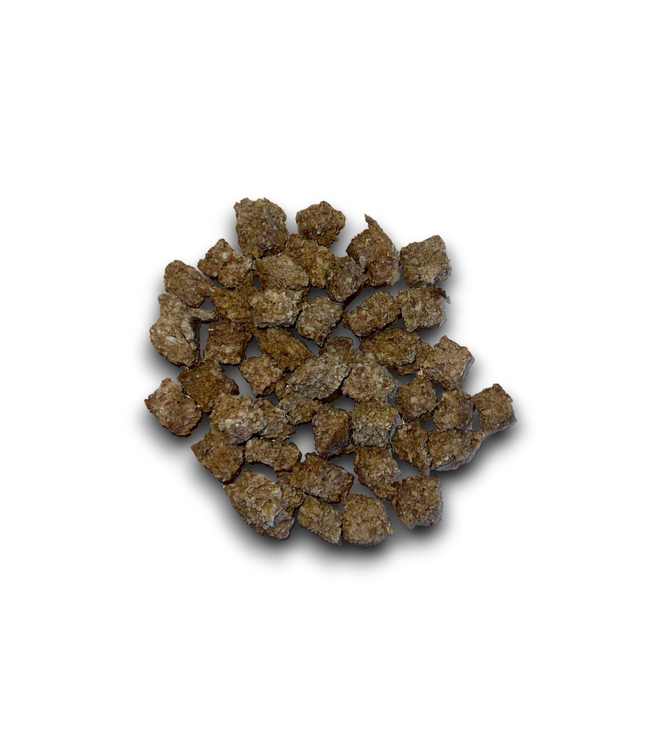 Studio image of a pile of brown Trainers Chicken.