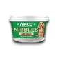 Stock image of the Anco Nibbles Beef Treats, showing the packaging pot with a green label and a dog on the front.
