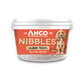 Stock image of the Anco Nibbles Salmon Treats, showing the packaging pot with a orange label and a dog on the front.