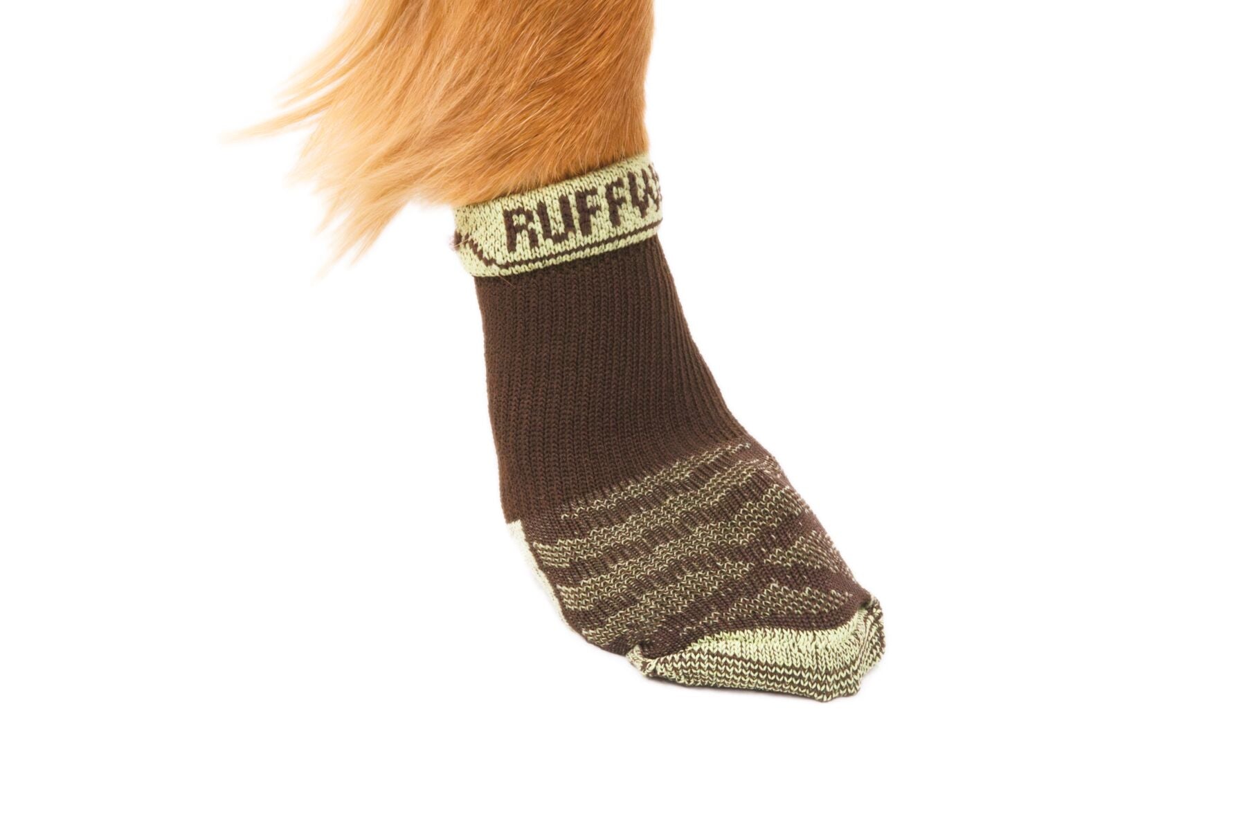 The Ruffwear Bark'n Boot Socks in Earth Brown being worn on a paw, with a white background.