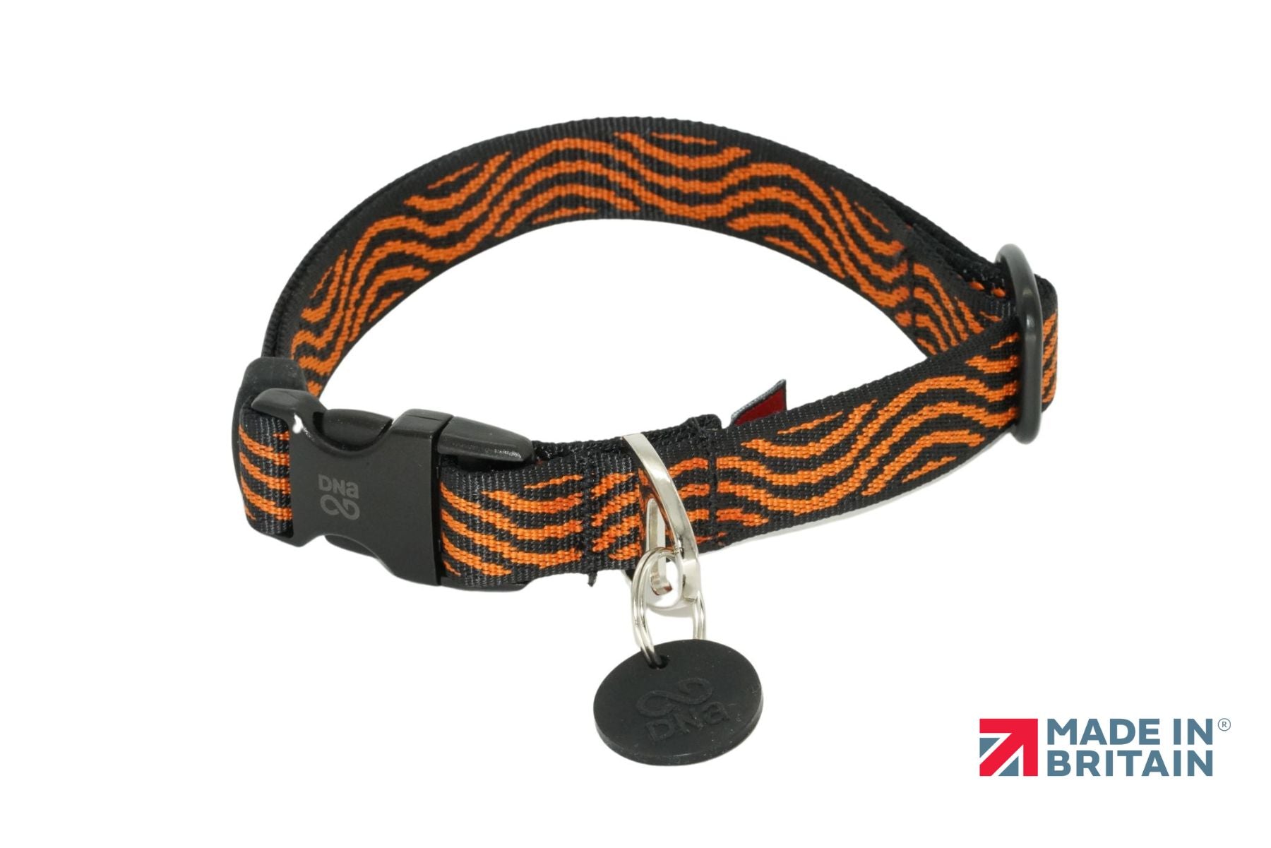 A stock image of the Explorer Collar in Ember Grey - black and orange striped dog collar with a white background.