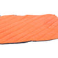 Orange quilted Bivvy Bed on a white background.