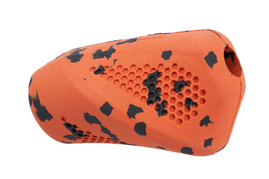 Orange Dog Throw Toy with black speckles on a white background.