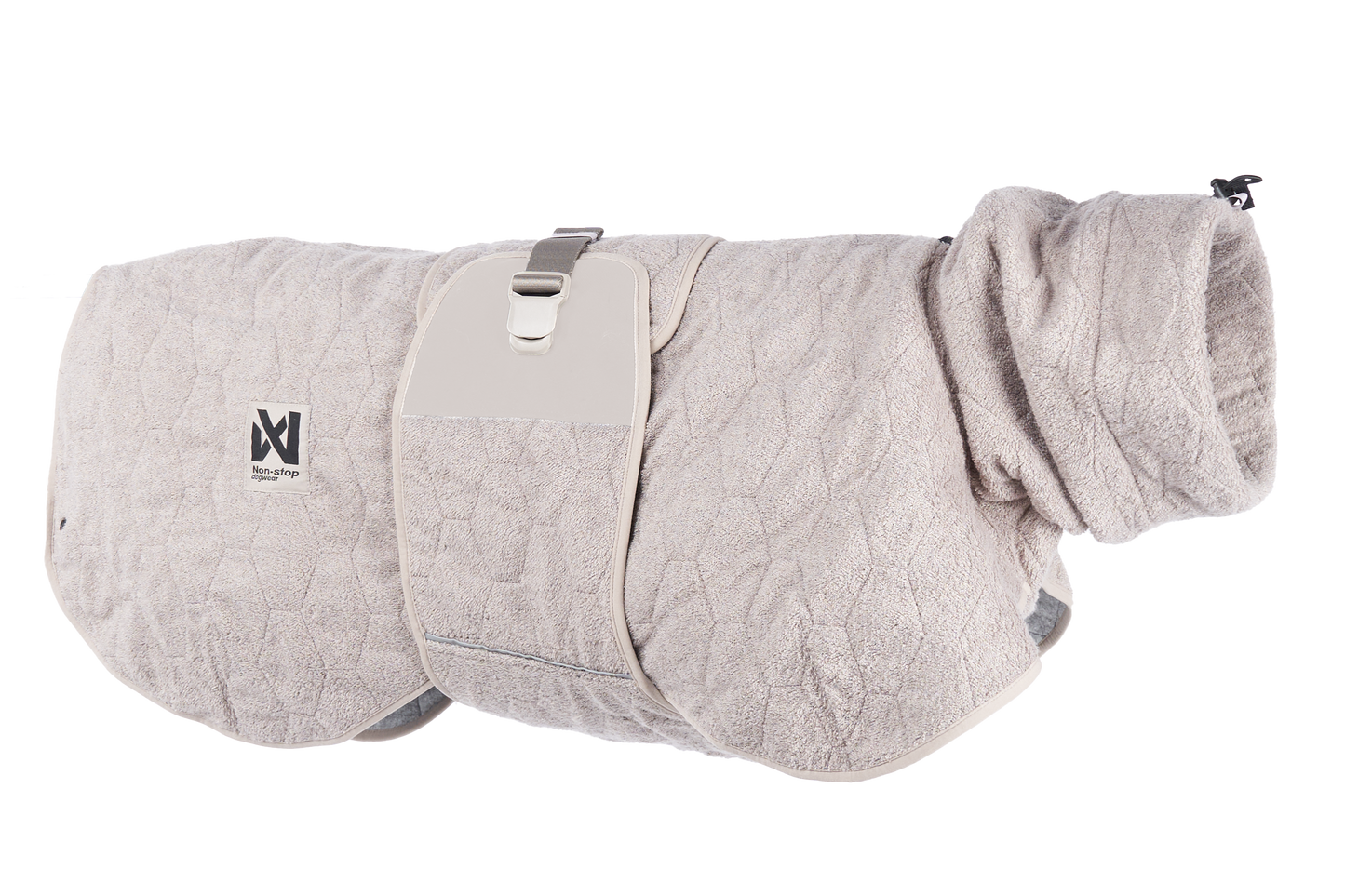 Stock image of the Drying Robe, in the sand colour, on a transparent background. Features hexagon lines, with Non-stop branding.