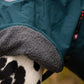 Lifestyle image of the Fjord Lined Jacket, showing the fur lining on a dalmatian.