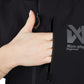 Person wearing an Obedience Vest Light, holding their hand in the front pocket.
