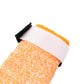 Close-up of the cuff of the Protector Booties High on a white background.
