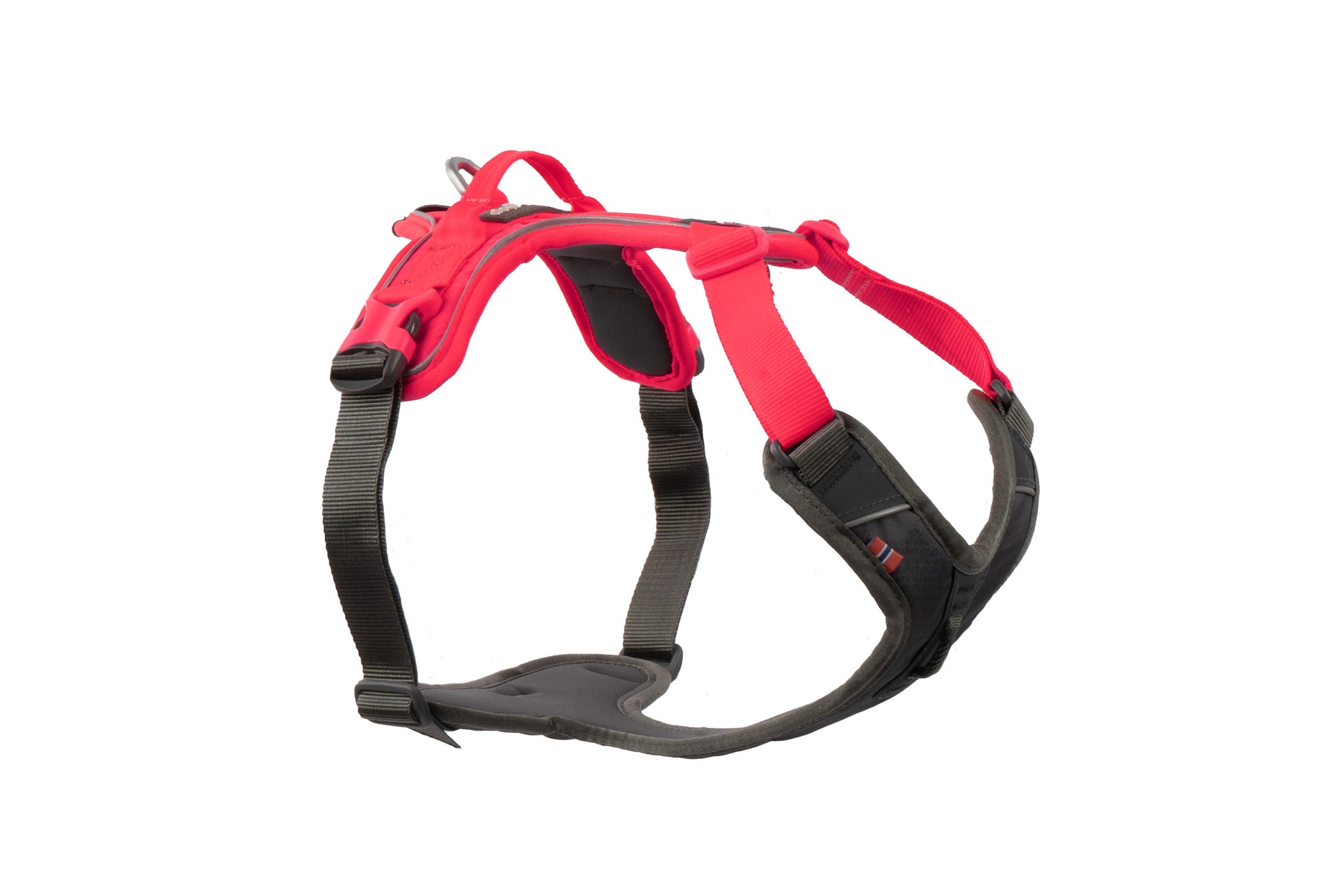 Stock image of the Ramble Harness, a pink and black harness with a handle, on a white background.
