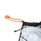 Detailed image of the Trail Light Backpack, a grey backpack with an orange lead attachment.