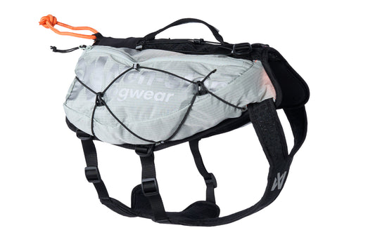 Stock image of the Trail Light Backpack, a grey backpack with Non-stop branding along the side, against a white background.