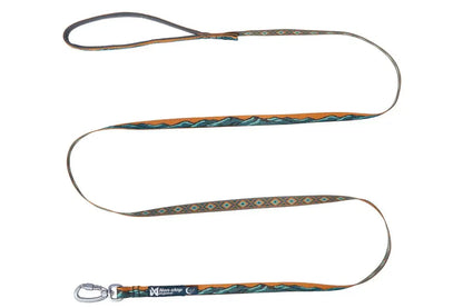 Stock image of the Trail Quest Lead, a teal and oak dog lead with mountain patterns, on a white background.