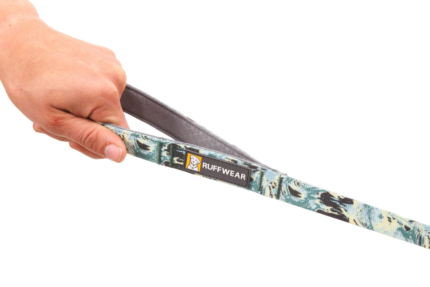 Stock image of the Front Range Lead, showing a hand holding the handle, with Ruffwear branding.