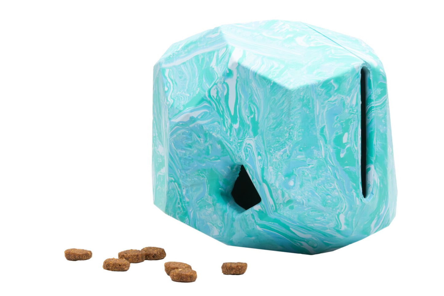 Stock image of the Gnawt-a-Rock, with treats beside it, on a white background.