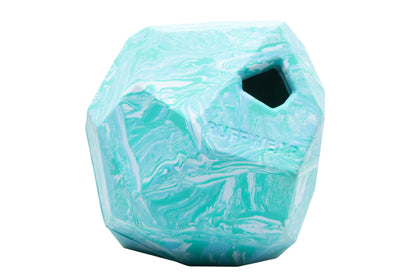 Stock image of the Gnawt-a-Rock in Glacial Blue, an irregular shaped dog toy with a hole in it, against a white background.