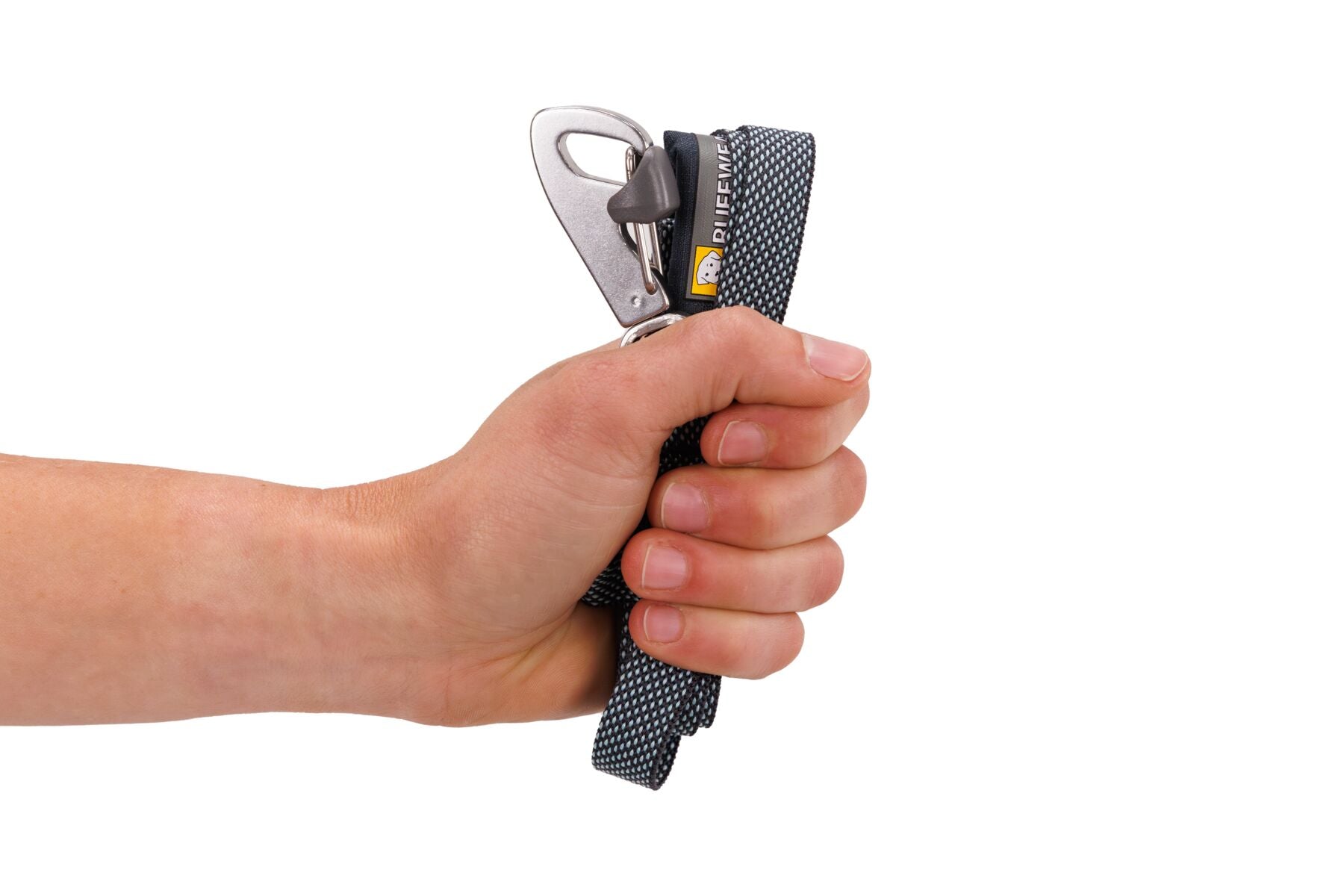 Stock image of the Hi & Light Lead in Basalt Grey, being held by a hand to show them packed down.