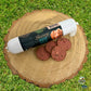 Nova Duck Pate on a log, with some cut slices.