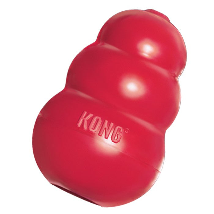 Stock image of the KONG Classic, a red treat-dispensing toy with KONG branding, against a white background. 