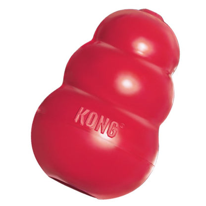 Stock image of the KONG Classic, a red treat-dispensing toy with KONG branding, against a white background. 