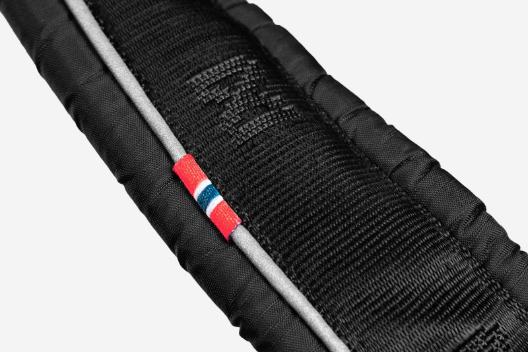 Detailed photo of the harness straps, on a white background.