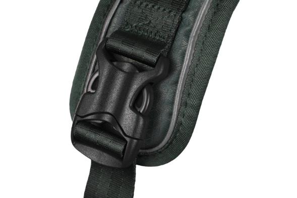 Detailed image of the Ramble Harness, showing the buckle of the harness, on a white background.