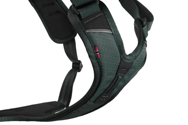 Detailed image of the Ramble Harness, showing the front clip of the harness, on a white background.