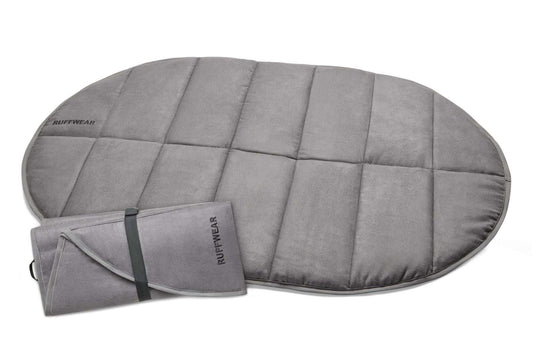 Stock image of the Highlands Pad , showing a dog sleeping bag on a white background, with a version folded up beside it.